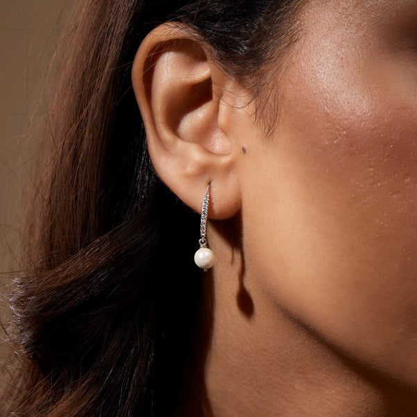 Studded Silver Dangling Pearl Earrings